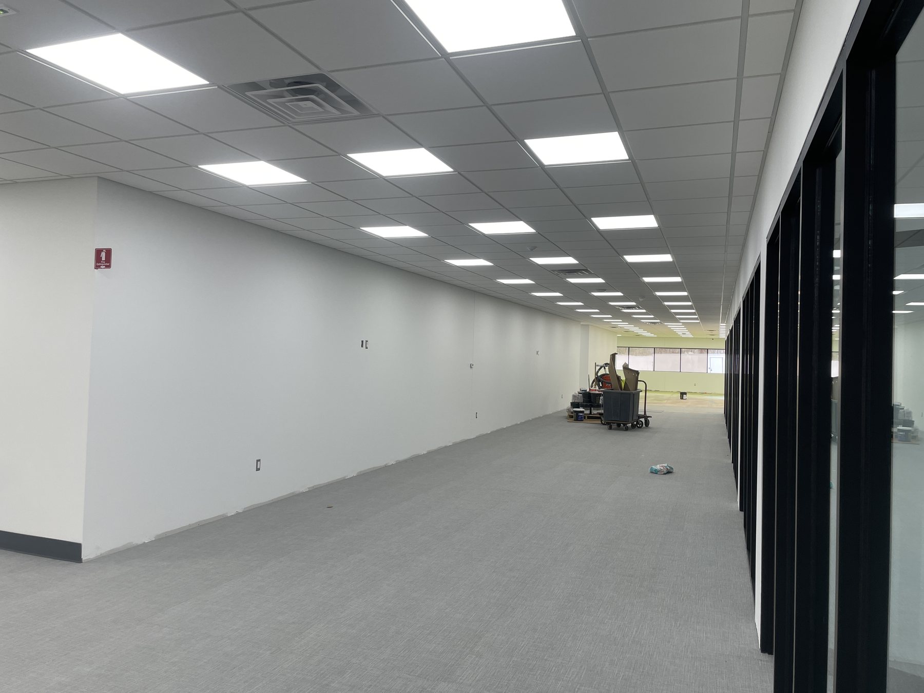 Finished suspended ceiling in a commercial office corridor